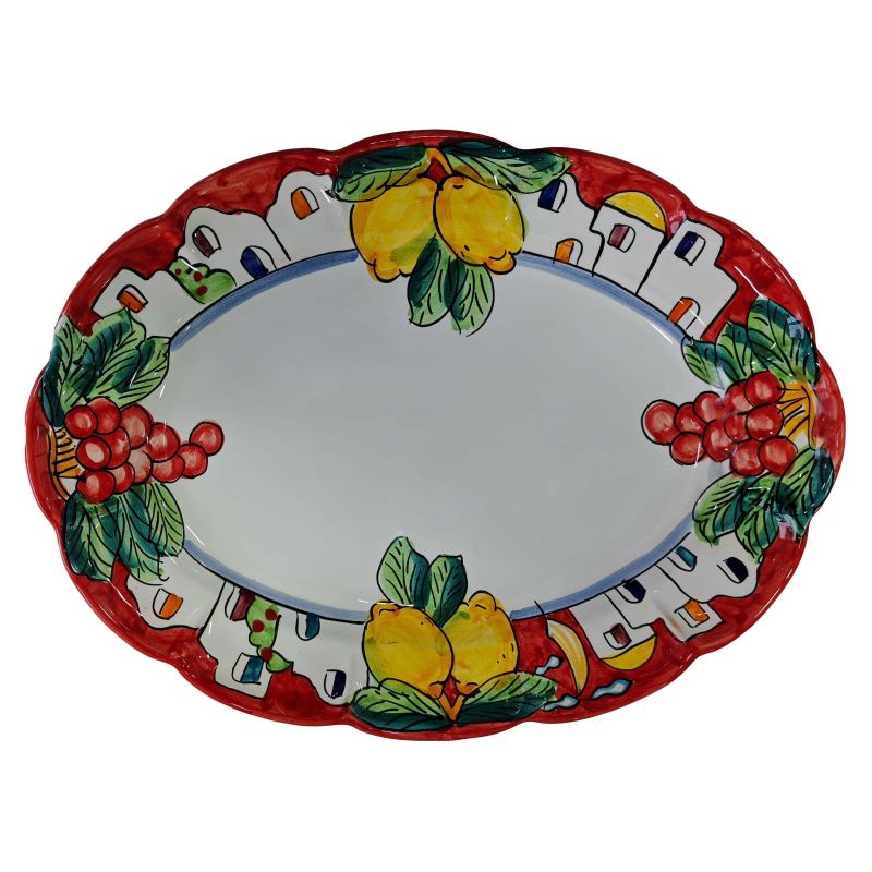 Plat ovale à bord ondulé. Collection Maisons &...