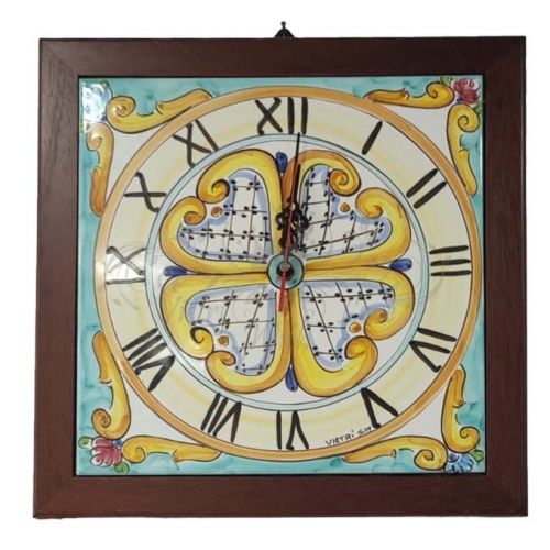 Wall clock. On tile. Wooden frame. Vietri ceramic....