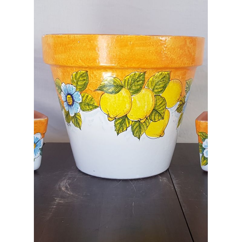 Vaso conico decoro limoni con bordo arancio....
