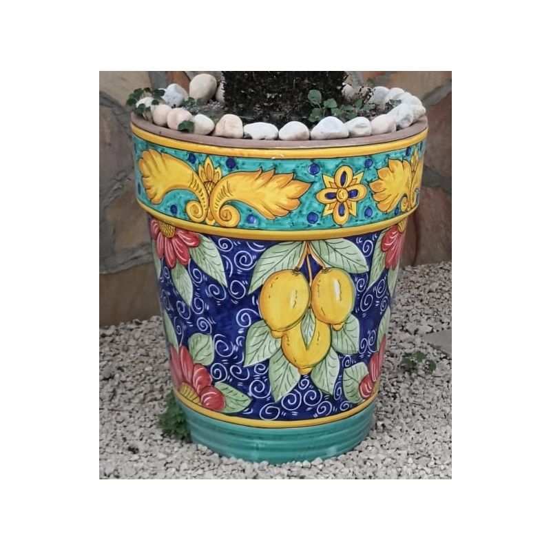 Conical pot for plants Blue background, lemons....