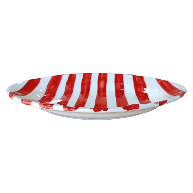 Oval scalloped serving plate. Stripes line....