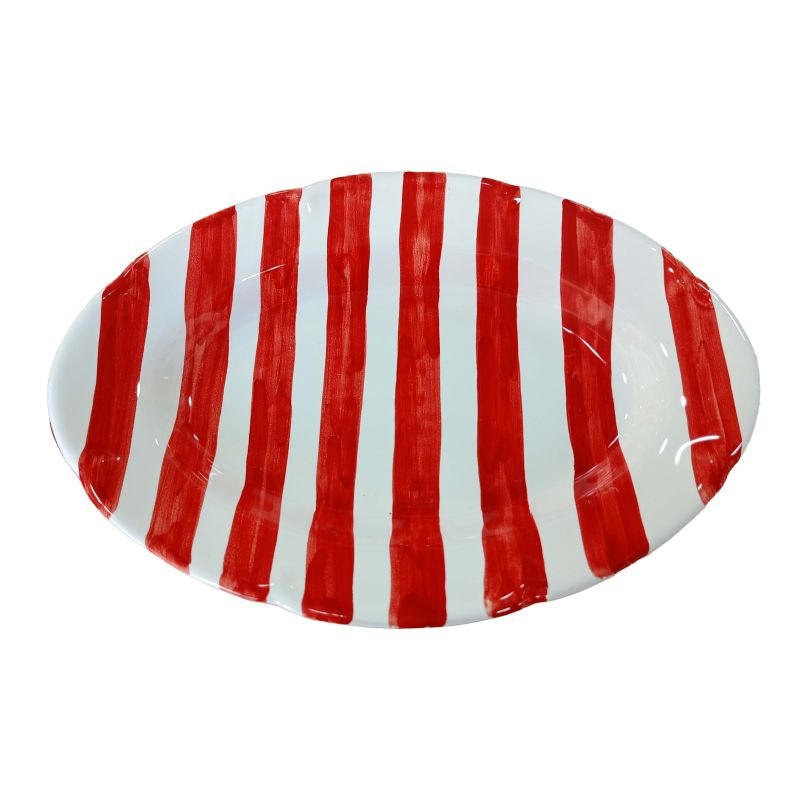 Oval scalloped serving plate. Stripes line....
