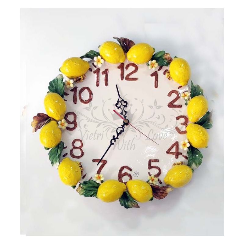 Horloge murale. Citrons en relief. Céramique de...