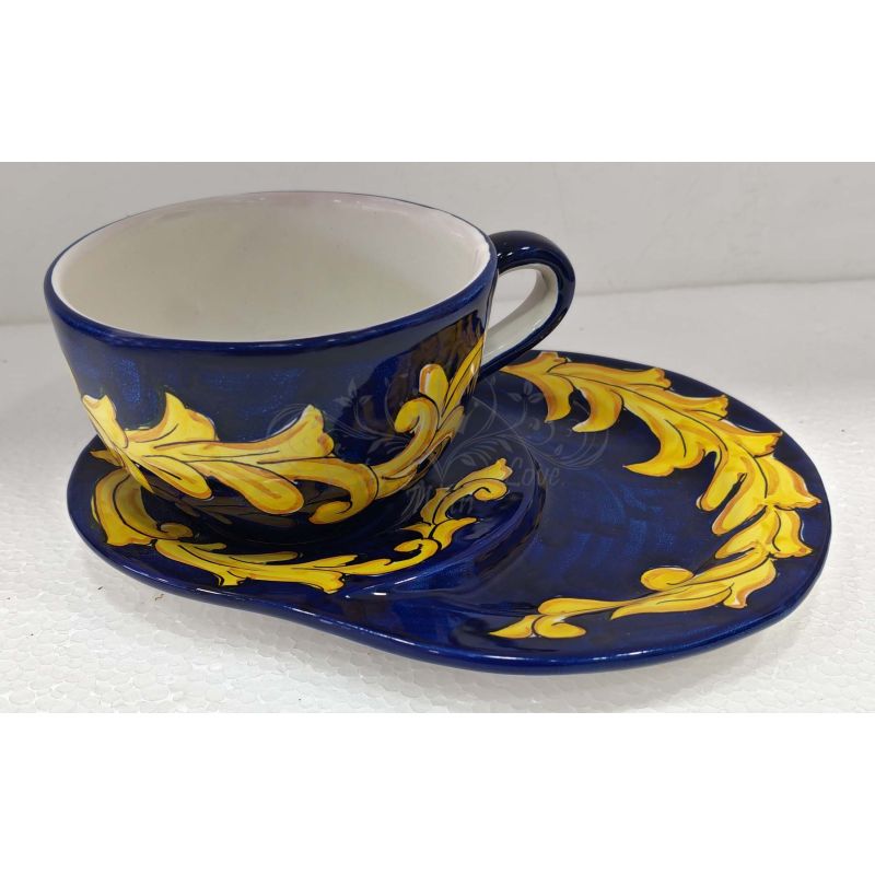 Milk cup with double saucer for biscuits,...