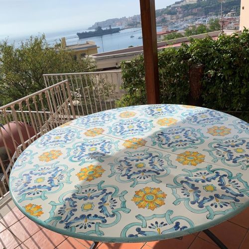 Table. Ceramic-coated lava stone table. Hand-painted...