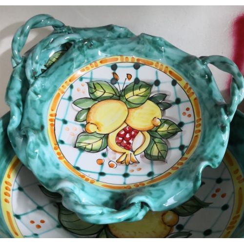 Centerpiece bowl with 3 handles. Wavy rim. Lemon...