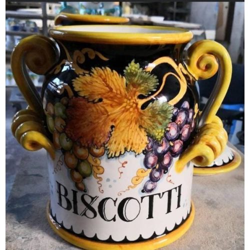 Biscuit Jar. Serpent Handles. Fruit and Leaves Design....