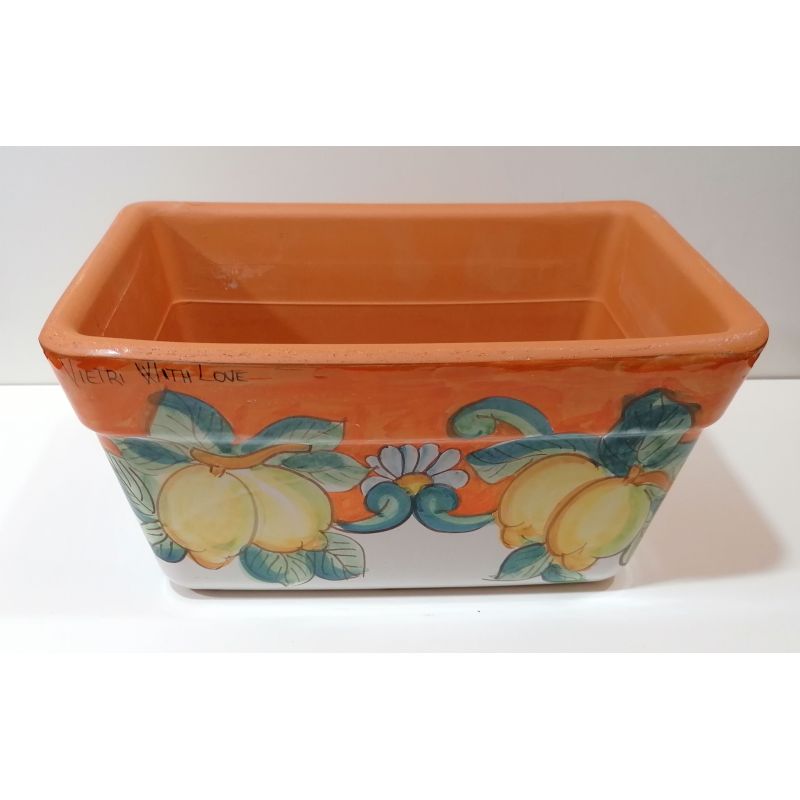 Jardinera rectangular. Fondo naranja con...
