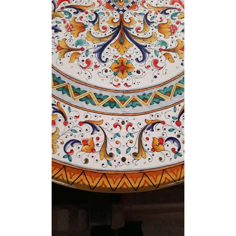 Table. Ceramic-coated lava stone table....