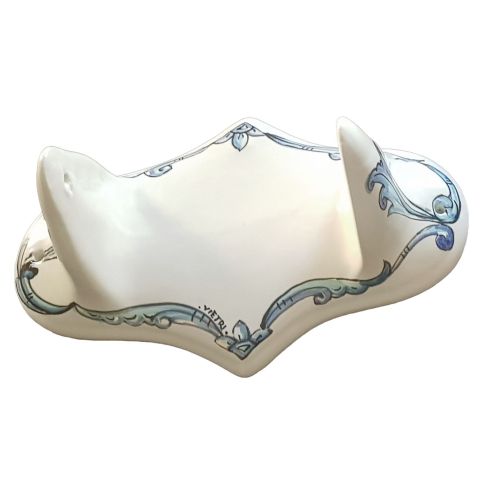 Papel higiénico soporte fondo blanco decoración azul. en cerámica Vietri pintada a mano.