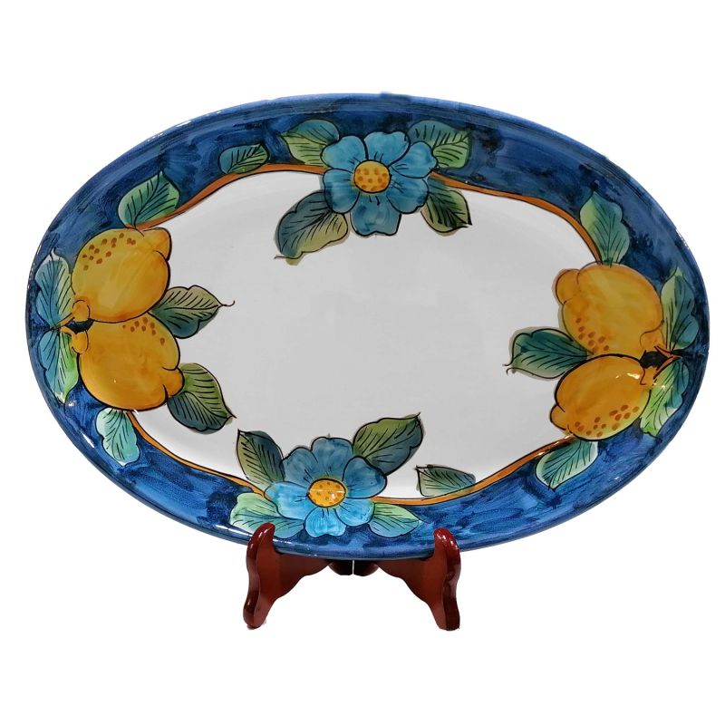 Oval scalloped serving plate. Lemons line....