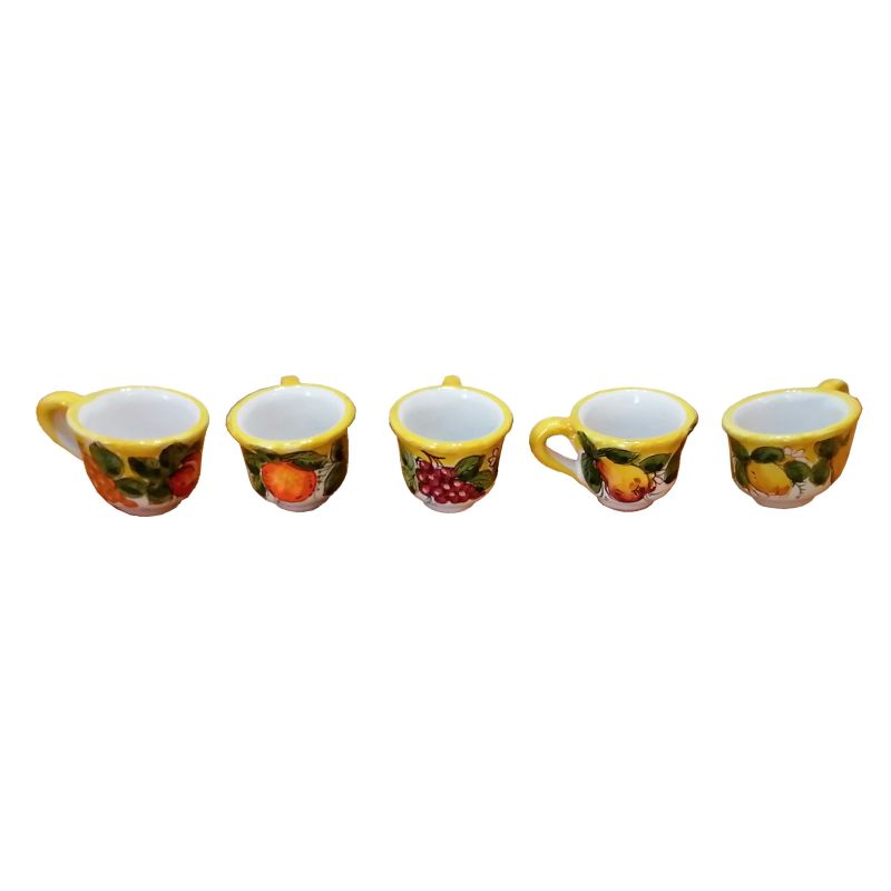 Tray with 12 cups and sugar bowl. Fruit line....