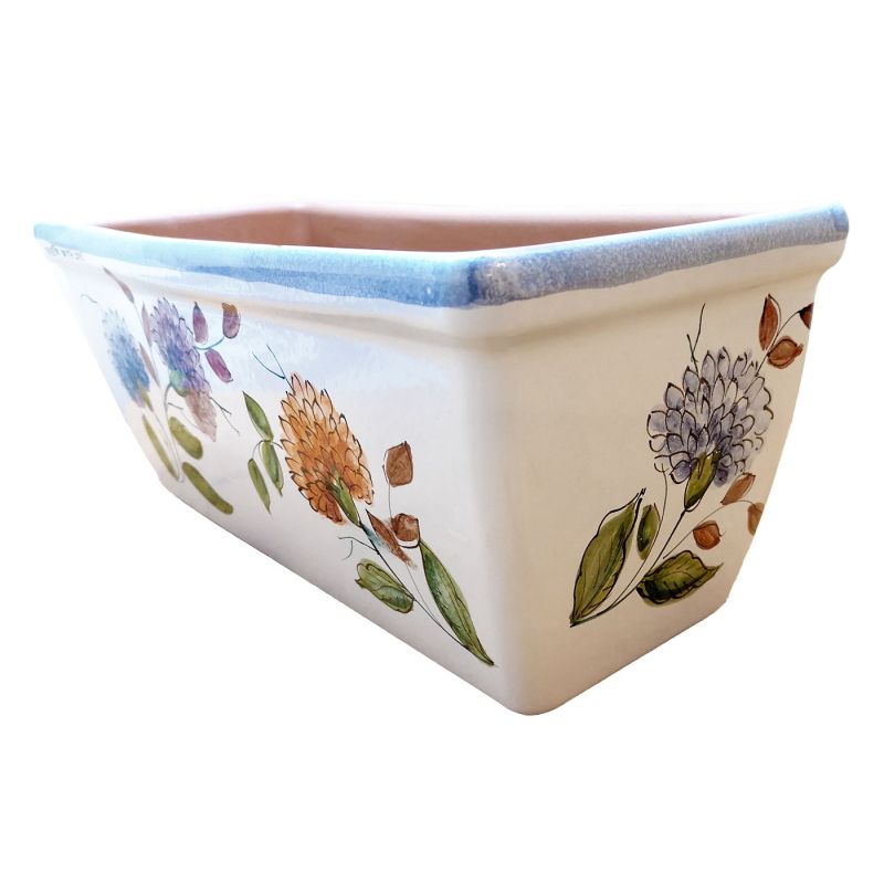 Rectangular Planter. White Base with Flowers....