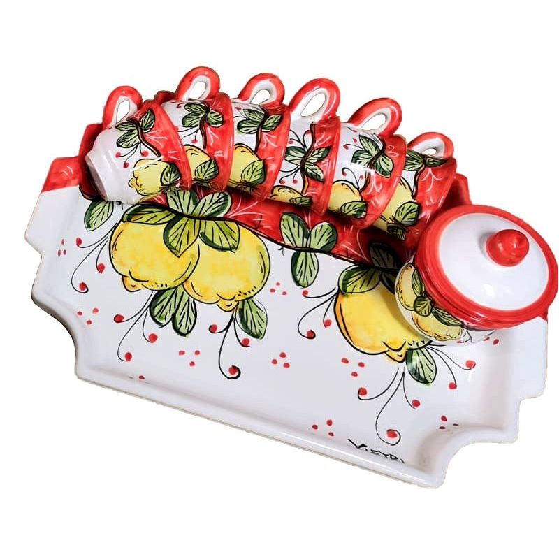 Tray with 6 cups and sugar bowl. Lemons line....