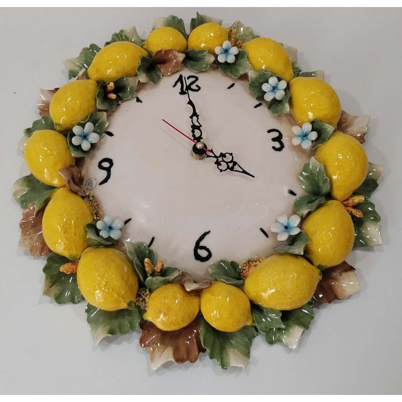 Wanduhr. Erhabene Zitronen. Vietri-Keramik....